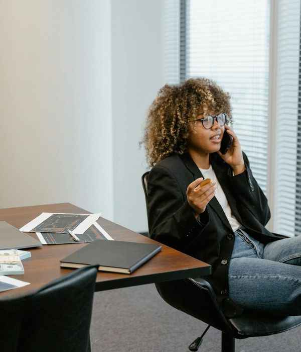 Modern office workspace with data analytics displays